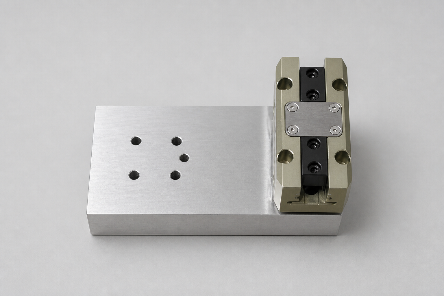 Aluminum base plate with a gold-anodized vertical machined assembly